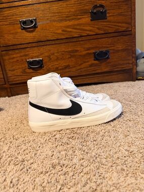 Nike High-Top White Sneakers with Black Swoosh
